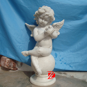 Small angel with bird sculpture